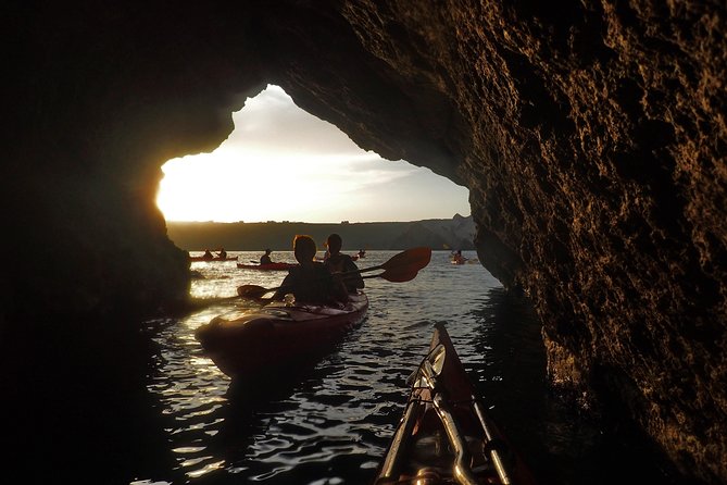 Santorini Guided Sea Kayaking with Light Lunch and Pick-up Option - Sea cave time and snorkeling in clear water