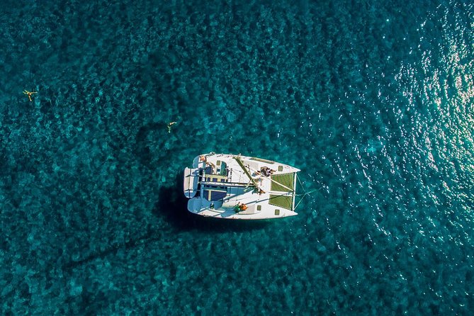 Santorini Half Day Catamaran Private Cruise incl. Meal, Drinks & Free Transport - Why a private catamaran half-day makes Santorini easier