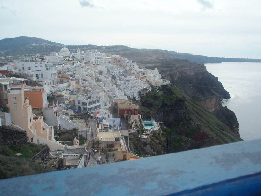 Santorini: Half-Day Sightseeing Tour with Hotel Pickup - Oia time: castle vibes, shopping lanes, and managing the crowds
