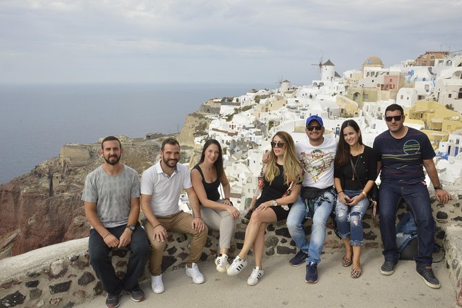 Santorini Highlights and Venetian Castles Small-Group Day Tour - Perissa black sand: a real pause for swimming and lunch