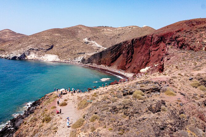 Santorini Highlights Minibus Tour with Oia Sunset - Perissa Black Sand Beach: Time to Swim, Plus a Lunch Reality Check