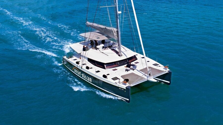 Santorini: Luxurious Catamaran Cruise with Meal & Open Bar - Palea Kameni hot springs swim: warm water, sulfur rules