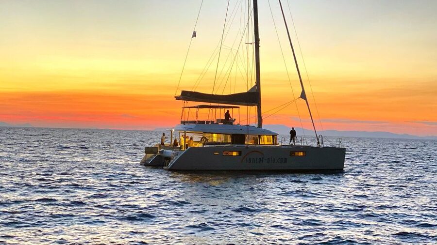 Santorini: Luxurious Catamaran Cruise with Meal & Open Bar - Crew service and the onboard comforts that actually help