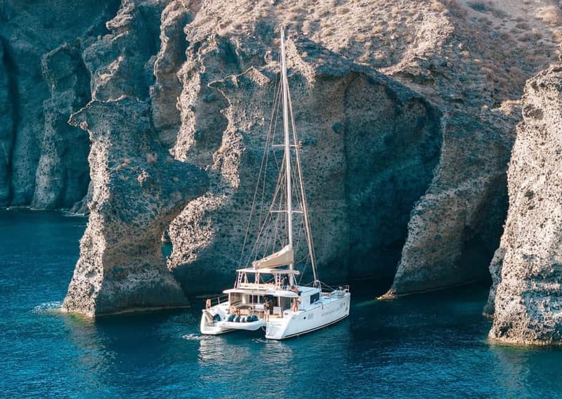 Santorini: Luxury Catamaran Cruise with Lunch, BBQ & Drinks - Mesa Pigadia Beach: your first real swim