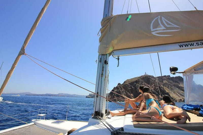 Santorini: Luxury Catamaran Cruise with Lunch, BBQ & Drinks - Thirasia island: swimming plus lunch, BBQ, and drinks