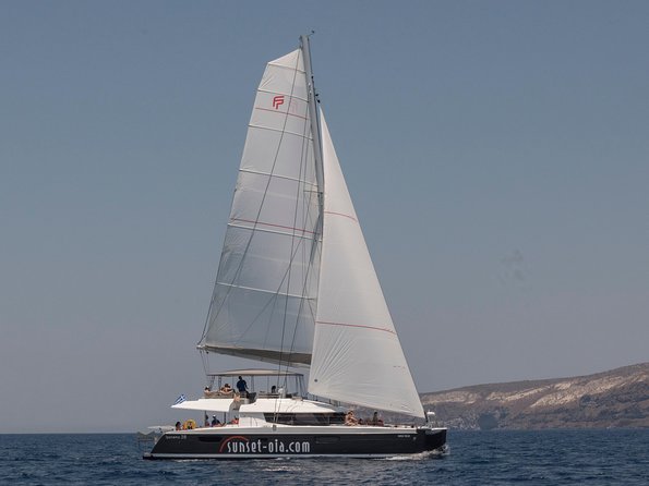 Santorini Luxury Catamaran Day Cruise with BBQ,drinks,transfer - Why This Santorini Catamaran Feels More Luxurious Than Most