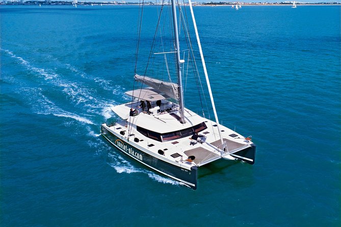 Santorini Luxury Catamaran Day Cruise with BBQ,drinks,transfer - Getting On Board at Ammoudi Bay: Pickup, Shoes, and Boarding Reality