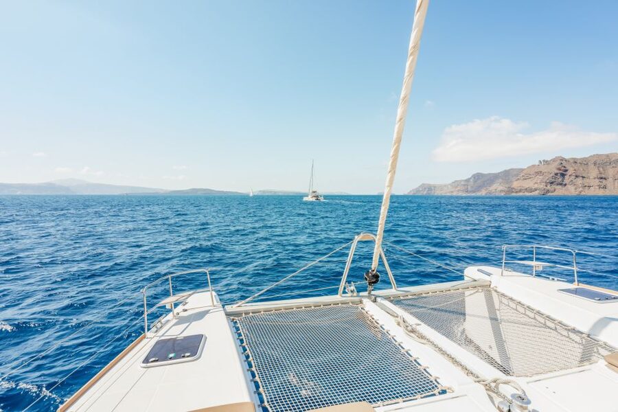 Santorini: Luxury Catamaran Day Trip with Meal and Open Bar - Hotel Pickup to Marina: Getting There Without Drama