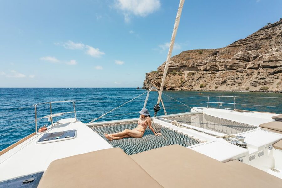 Santorini: Luxury Catamaran Day Trip with Meal and Open Bar - Red Beach and White Beach Snorkeling: How the Water Stops Work
