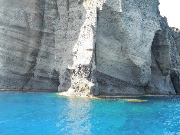 Santorini Luxury Catamaran Sunset Cruise with BBQ, Drink and Transfer - Drinks, music, and onboard comfort that keeps the day moving smoothly