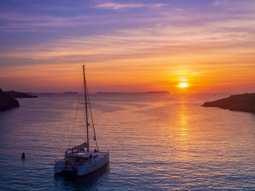 Santorini: Luxury Sunset Cruise with Dinner, BBQ, and Drinks - Mesa Pigadia Beach: Your First Real Water Time