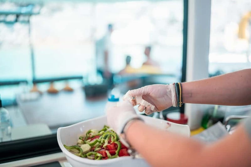 Santorini: Majestic Catamaran Cruise with Meal and Drinks - Who should book this catamaran cruise, and who should skip it