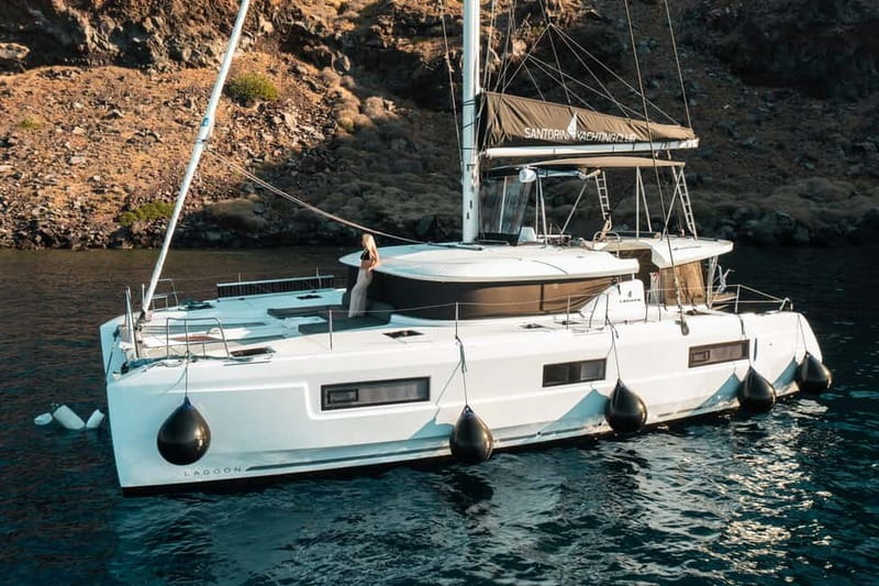 Santorini: Majestic Catamaran Cruise with Meal and Drinks - Getting there, meeting points, and what to bring for a smooth day