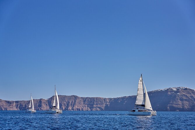 Santorini Oia: Caldera Luxury Day Cruise with BBQ & Drinks - Oia caldera views in four hours, with a max of 16 onboard