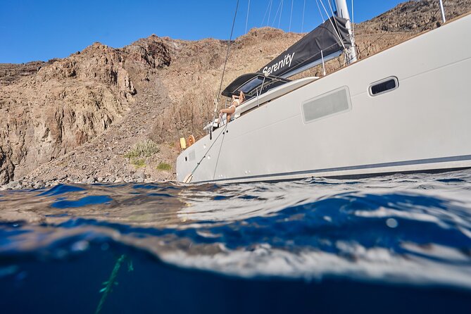 Santorini Oia: Caldera Luxury Day Cruise with BBQ & Drinks - Crew and sailing comfort: why Captain Mike, Jose, and Firas matter
