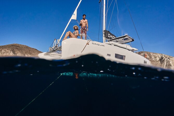 Santorini Oia: Luxury Sunset Cruise with Fresh Fish BBQ & Drinks - The Volcano Area and Sulfur Springs: What You’re Actually Seeing