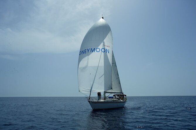 Santorini Oia: Private Sailing Yacht Cruise with Meal and Drinks - Thirassia: the calm-water swim stop that feels like a secret