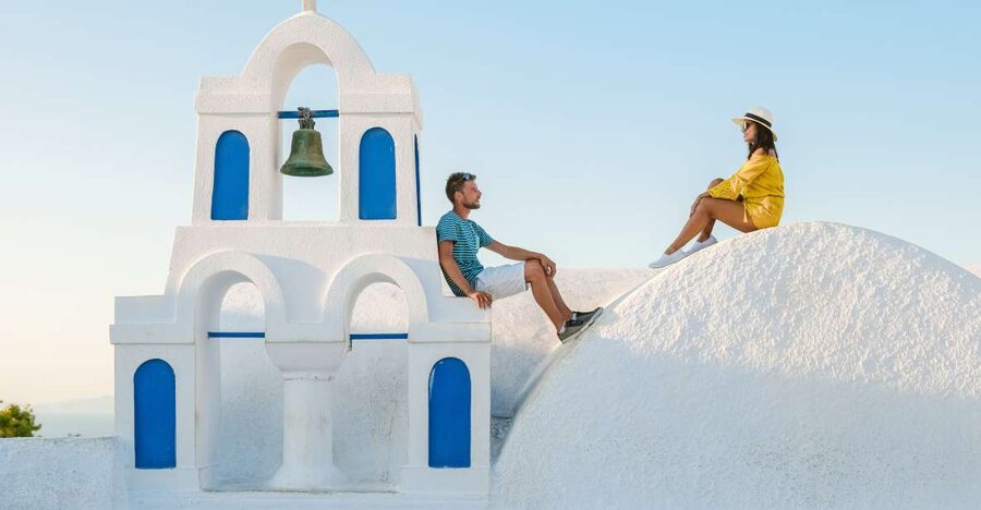 Santorini: Oia Village Professional Photo Shoot - The Oia cliffside shoot: where blue domes meet real posing help