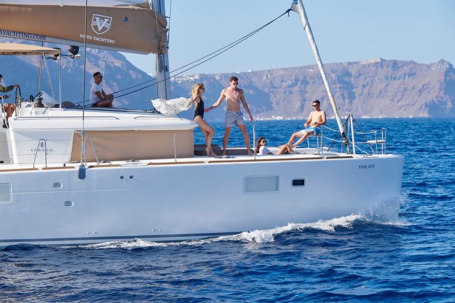 Santorini: Platinum Catamaran Cruise w/ BBQ Meal & Open Bar - Sunset time off Akrotiri: Moschato D’Asti, champagne tasting, and a view without the crush