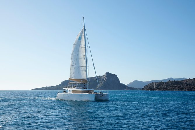 Santorini Platinum Catamaran Cruise with Meal, BBQ and Open Bar - The Mesa Pigadia swimming stop, snorkeling gear, and snack timing