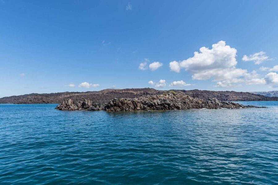 Santorini Port: 3 Hour Cruise to Volcano and Hot Springs - Swimming logistics, safety, and what the boat can mean for you