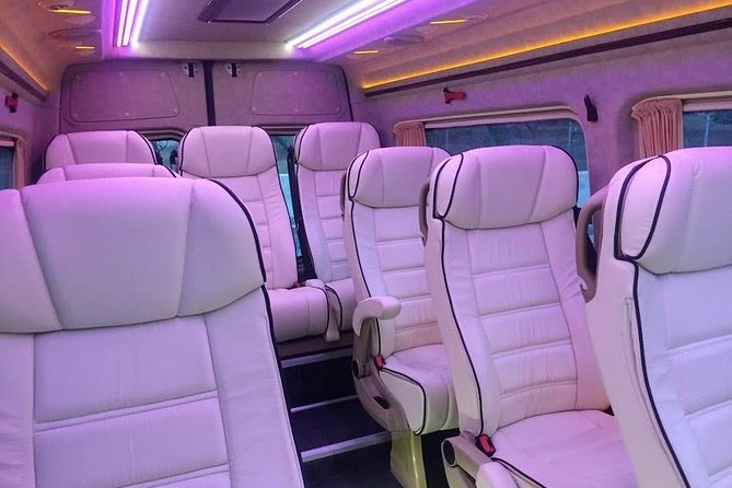Santorini Port Transport & Transfer Services - Inside the ride: comfort, quick photo stops, and bottled water