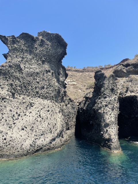 Santorini: Private All-In Catamaran Cruise, with Food|Drinks - Red Beach Swim, White Beach Photos, and Caldera Sightseeing