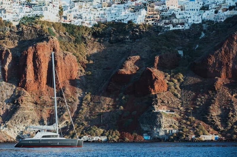 Santorini: Private Catamaran Cruise with BBQ Meal and Drinks - Thirassia, Manolas Village Views, and Volcano Energy