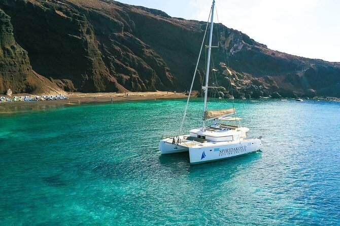 Santorini Private Catamaran Cruise with BBQ, Open Bar & Transfers - White Beach: your boat-only swim and snorkeling payoff