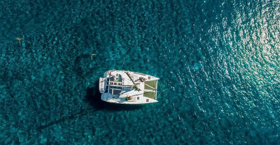 Santorini: Private Catamaran Cruise with Food & Drinks - Akrotiri Lighthouse, Indian Rock, and the Caldera Viewpoints You Cannot Recreate on Land