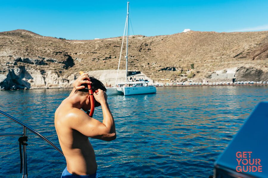 Santorini: Private Catamaran Tour with BBQ Meal and Drinks - Pass-by moments: Akrotiri and Thirasia, plus a quick look at Manolas