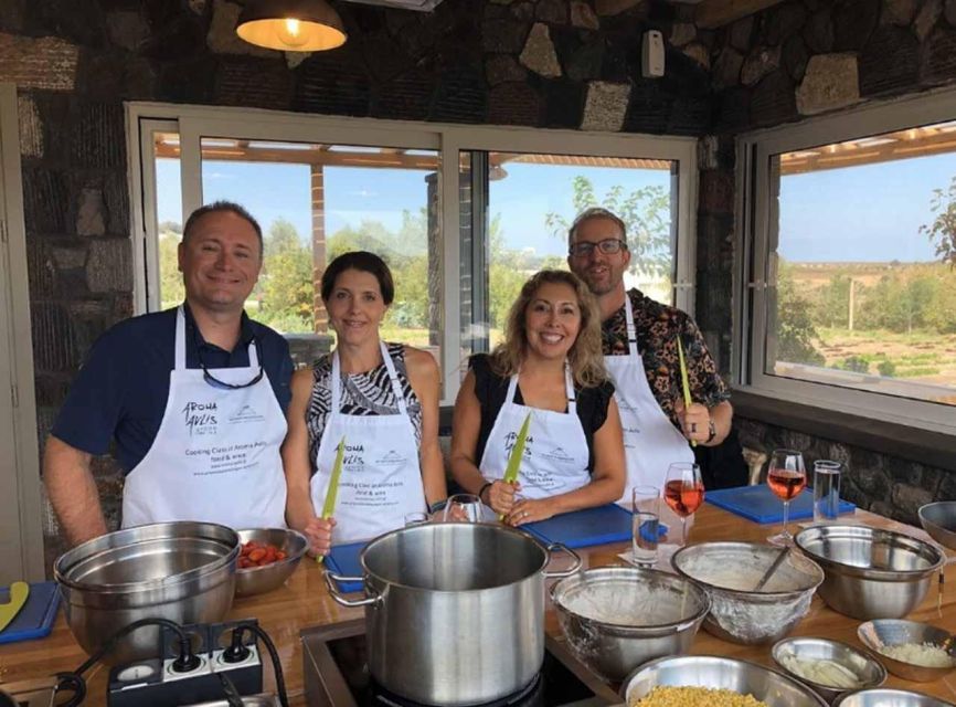 Santorini: Private Cooking Class and Wine Tasting Tour - Stop one: the volcanic vineyard walk and basket vines