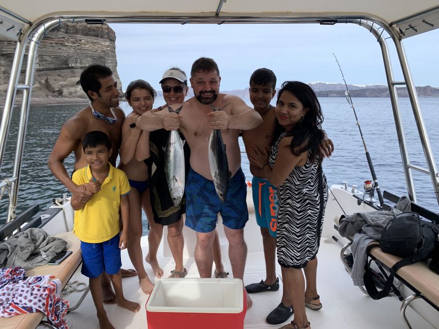 Santorini Private Cruise boat fishing tour - BBQ, Snorkeling - Beach stops in crystal-clear water, with snorkeling gear included