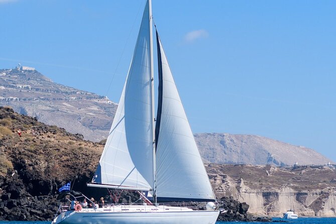 Santorini Private Daytime Sailing Cruise with Meal, Drinks &Transfer included - Thirasia Swim Bay and Onboard Lunch: The Moment Your Day Turns into a Vacation