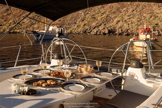 Santorini Private Daytime Sailing Cruise with Meal, Drinks &Transfer included - The Return Route: Lighthouse, Crocodile Island, and Aspronisi’s Quiet Drama