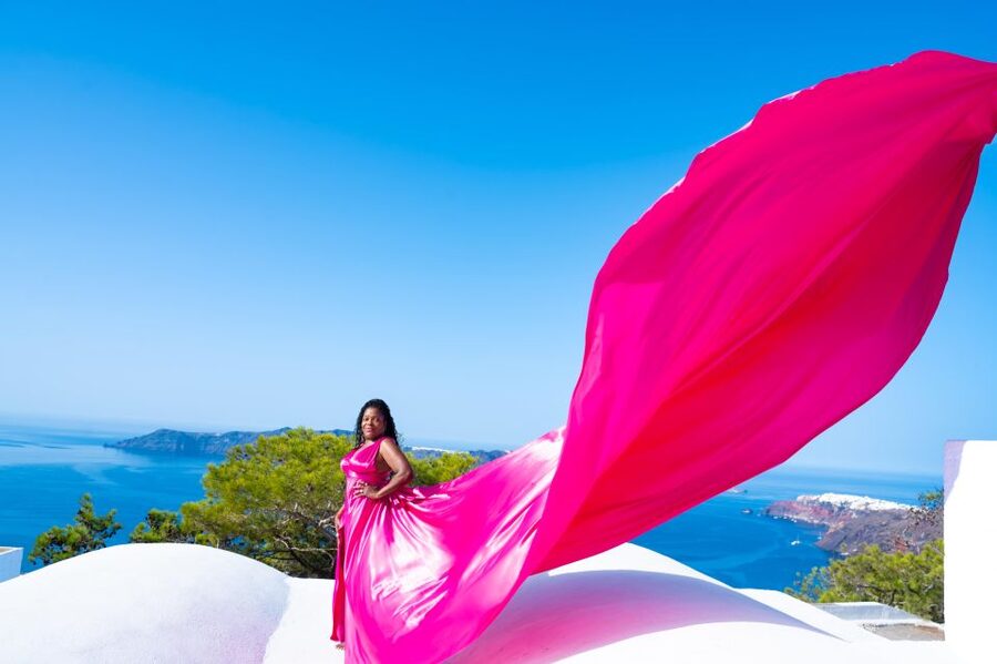 Santorini: Private Flying Dress Photoshoot with Pickup - Meeting Vicky in Thera, with pickup that actually feels easy