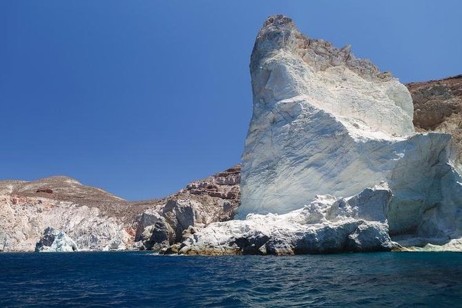 Santorini Private Motor Yacht Cruise - White Beach and the Venetian Lighthouse area: your first swim stop