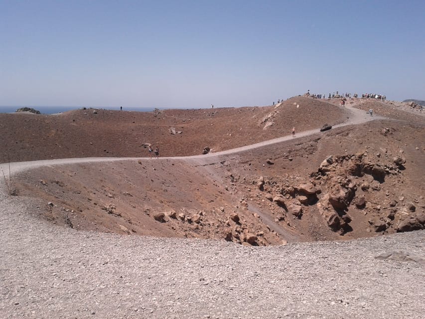 Santorini: Private Motorboat Cruise and Volcano Hike - Boarding at Ammoudi and the quick orientation on the water