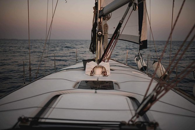 Santorini Private Sunset Sailing Tour with Dinner, Drinks &Transfer included - Between the volcanoes and sulfur-warm-water areas