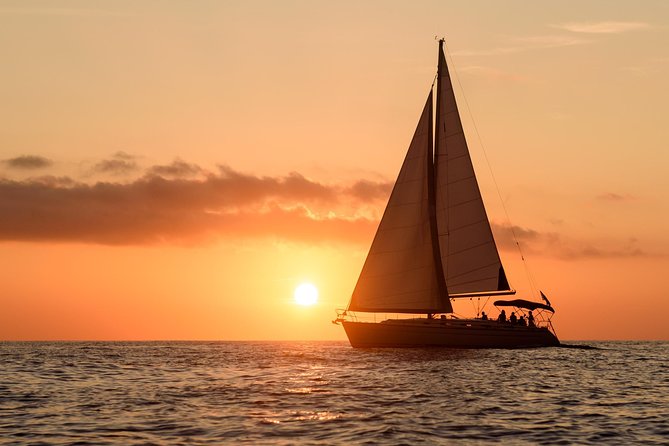 Santorini Private Sunset Sailing Tour with Dinner, Drinks &Transfer included - Thirassia swim: calm water, sunset light, and a breather