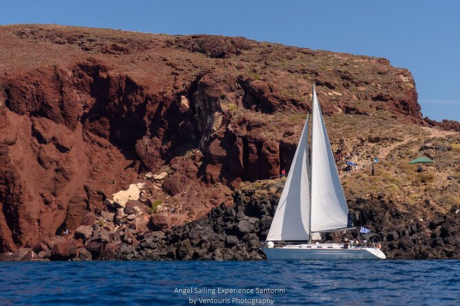 Santorini Private Sunset Sailing Tour with Dinner, Drinks &Transfer included - Dinner onboard and drinks that keep the mood easy
