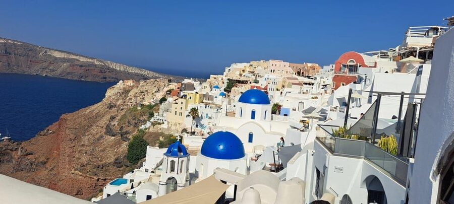 Santorini: Private Tour in Spanish with Local Guide - Red Beach at Akrotiri: volcano rocks and a color-first moment