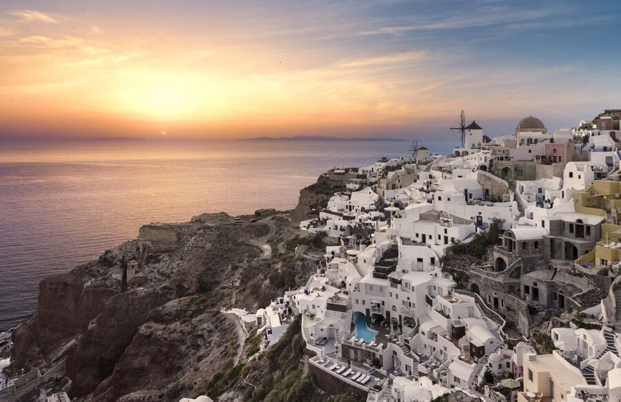 Santorini: Romantic Sunset Caldera Cruise with Dinner - The Santorini sunset moment: timing, clouds, and photo angles