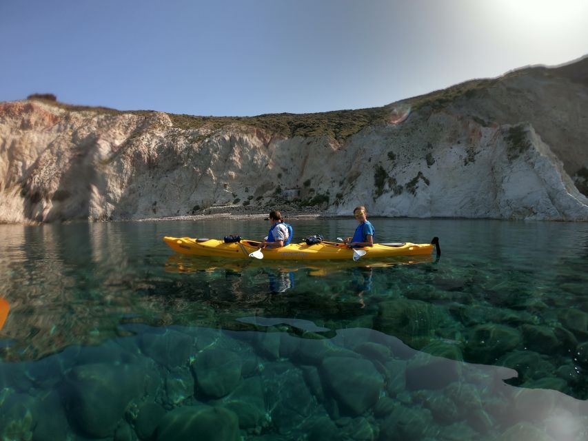 Santorini: Sea Caves Kayak Trip with Snorkeling and Picnic - Paddling the south coast of Santorini toward Akrotiri caves