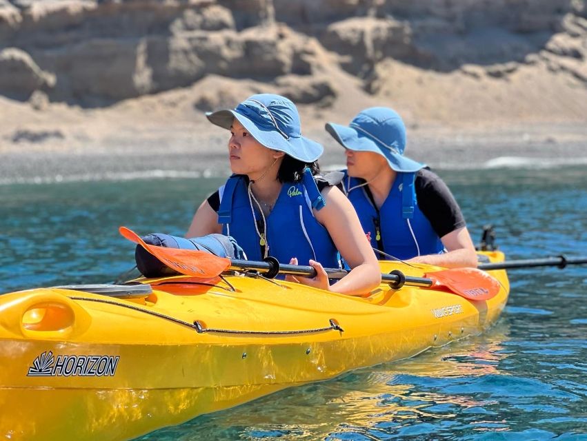 Santorini: Sea Caves Kayak Trip with Snorkeling and Picnic - White Beach cliff jumping, adrenaline with guidance