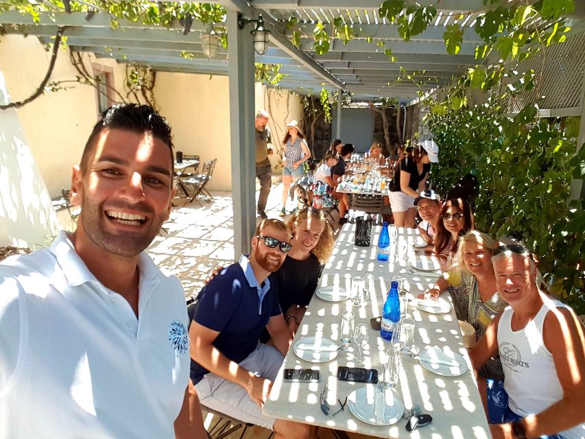 Santorini: Semi- Private wine tour - Through the grapevine - Semi-private size, luxury van, and pickup that keeps your day sane