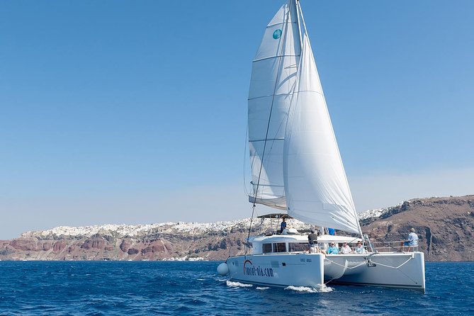 Santorini Small-Group Catamaran Sailing Trip(BBQ,drinks, transfer) - The itinerary in plain English: beaches, lighthouse views, then hot springs