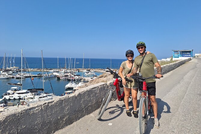 Santorini Small Group Guided E-bike Tour & Local Tomato Museum - Akrotiri and the Venetian castle viewpoint: caldera views with momentum