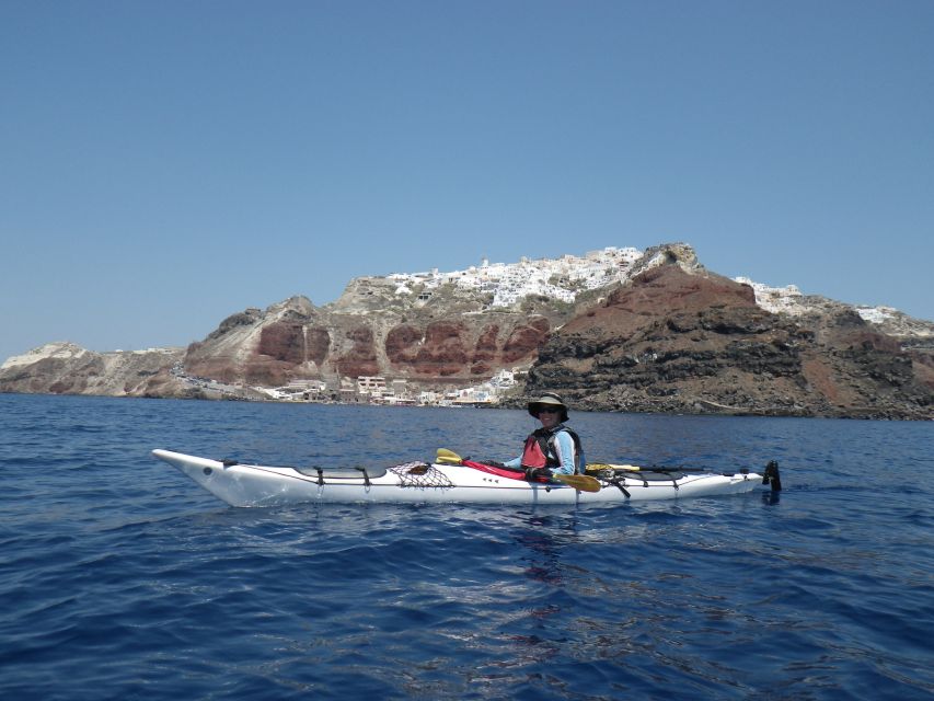 Santorini: South Sea Kayaking Tour with Sea Caves and Picnic - White Beach swim and snorkeling break: when the water takes over