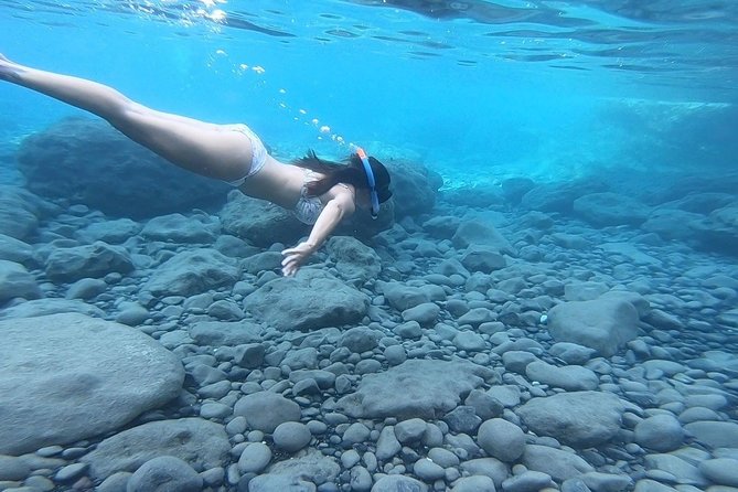 Santorini Stand-Up Paddle and Snorkel Adventure - Snorkeling stop: crystal-clear water and what to expect in real terms